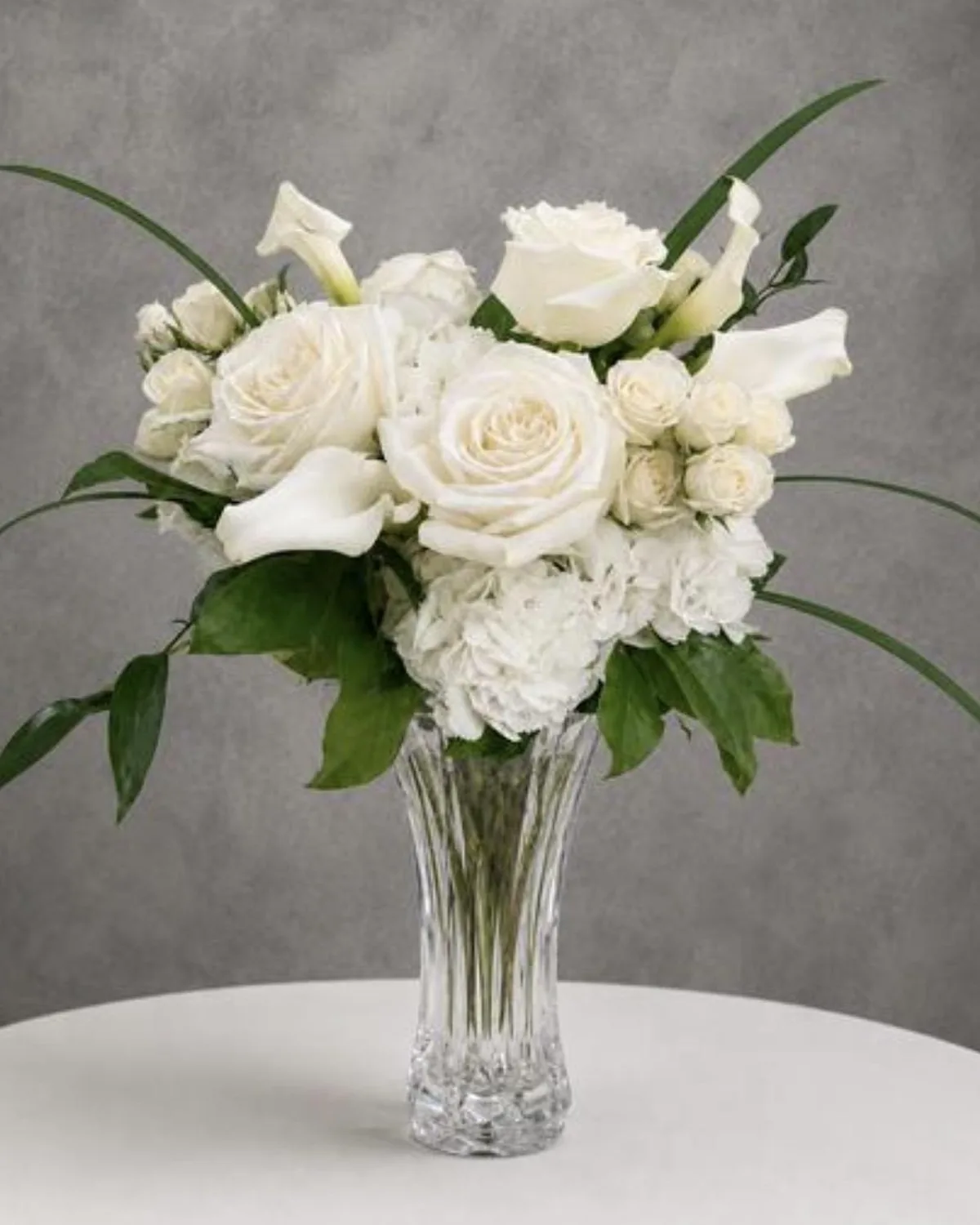White & Green Sympathy Flowers — MAYDE floral delivery on DoorDash