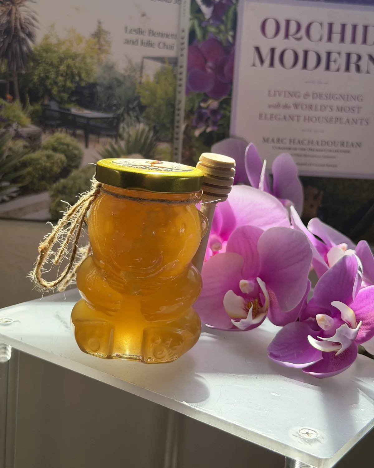 Raw honey jar tied with twine and a gold lid, ready for a MAYDE gift basket